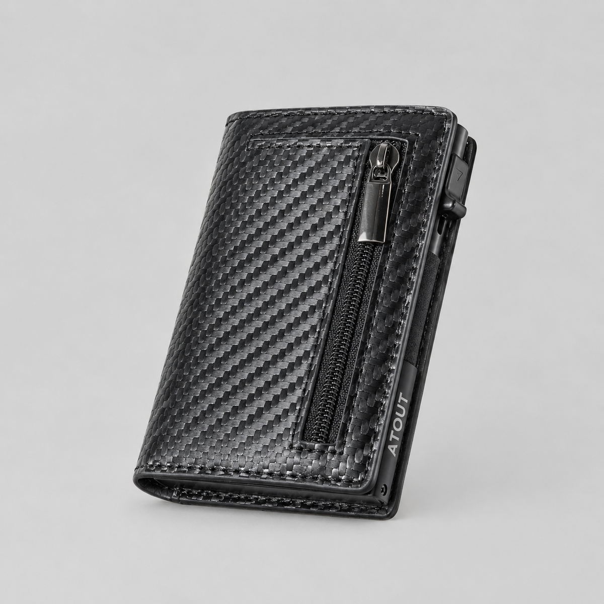 Portefeuille compact ATOUT coloris carbone — zip et glissière latérale, logo ATOUT gravé